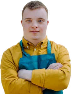 Disabled man with down syndrome smiling at camera with arms crossed