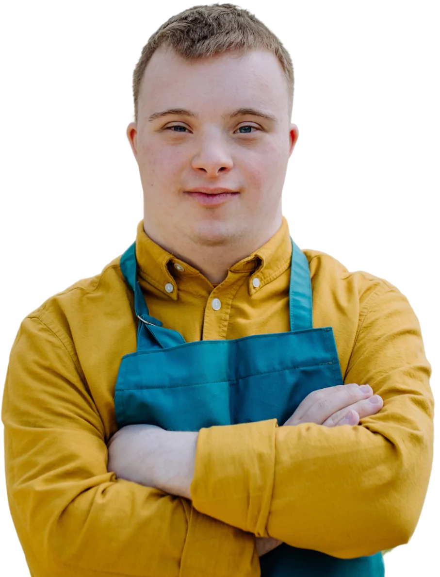 Disabled man with down syndrome smiling at camera with arms crossed