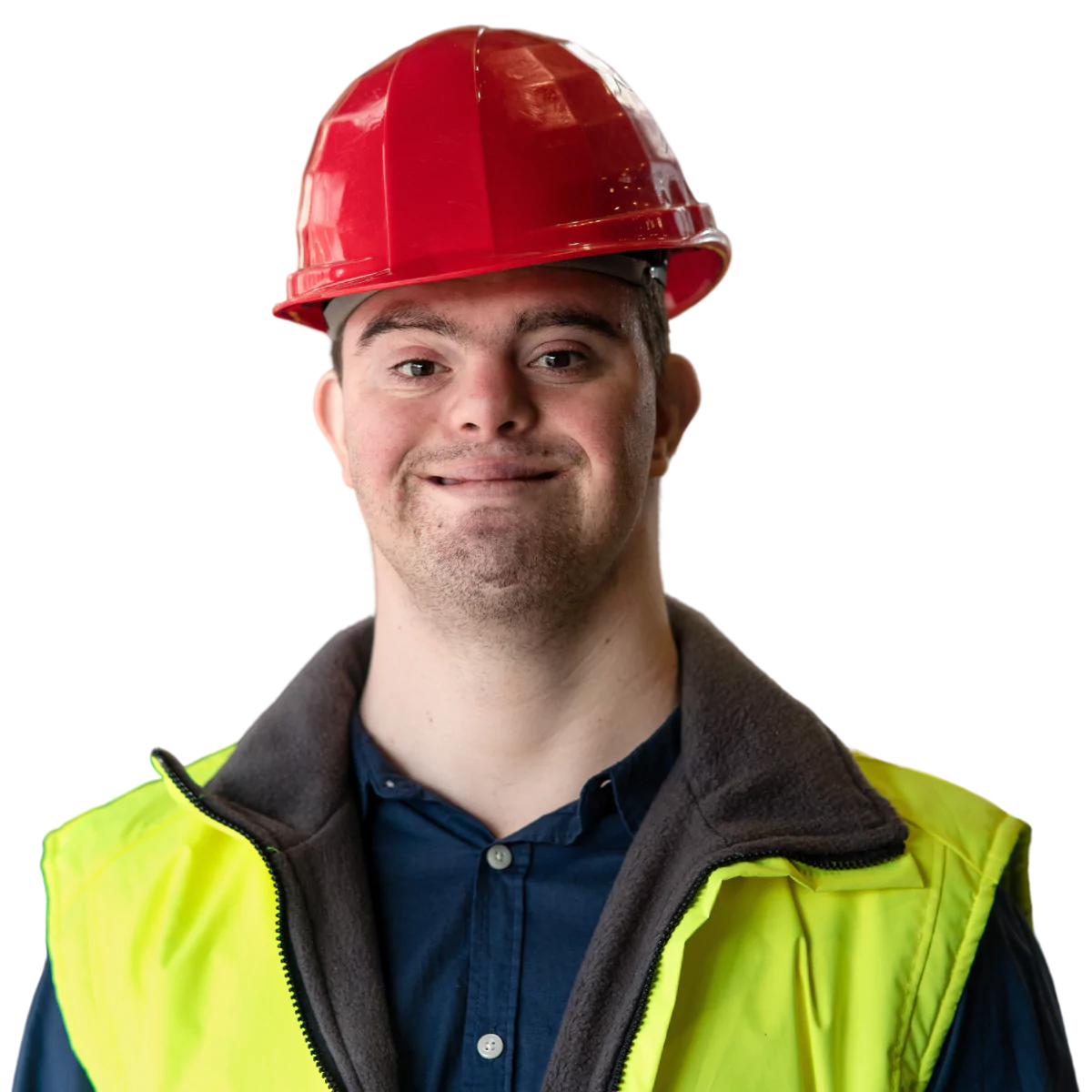 Disabled man with down syndrome smiling at camera wearing hi vis vest and hard hat